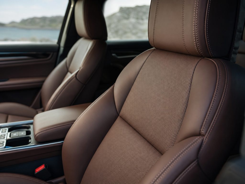 Balancing Premium Comfort and Road-Trip Utility: The Best Mid-Size Luxury SUVs (article editorial guide): a close-up detail shot of the subject