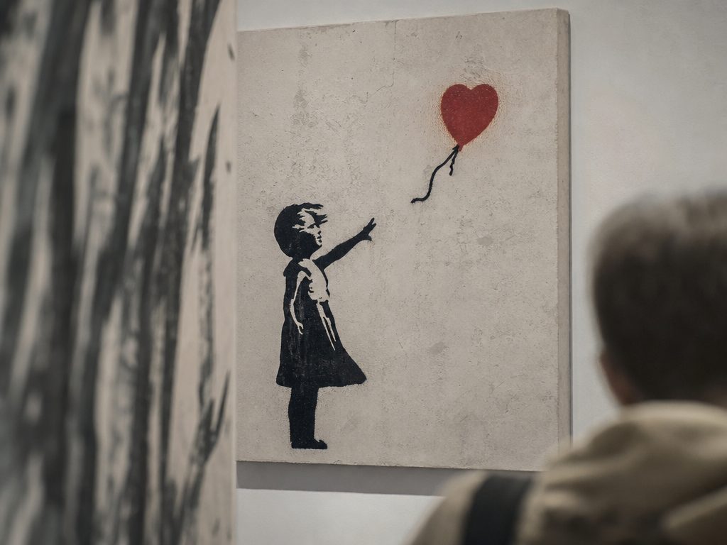 Navigating Unauthorized Banksy Exhibitions: A Smart Fan's Guide (article editorial guide): a close-up detail shot of the subject